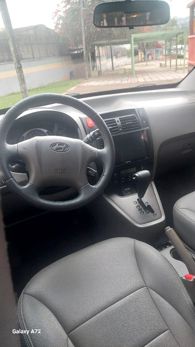 Tucson  2012 2.0 Gls gasolina automático - foto 9